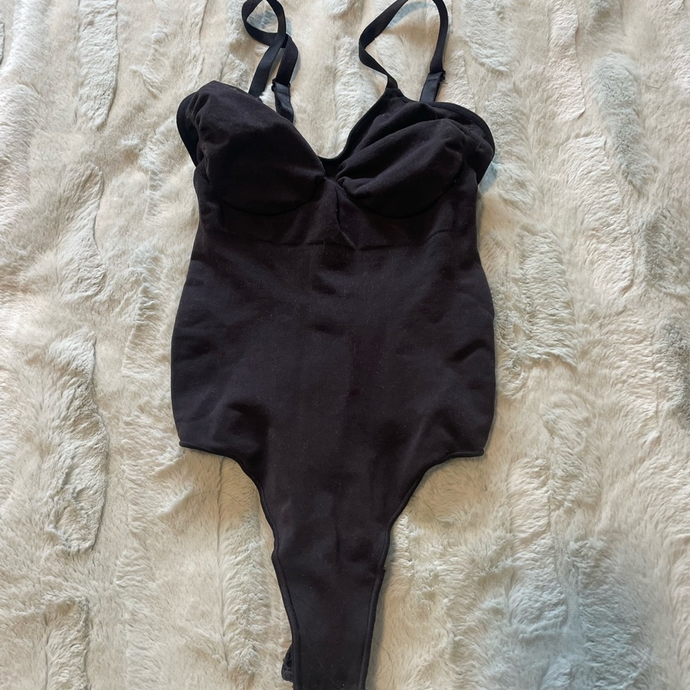 seamless sculpt thong bodysuit skims in onyx